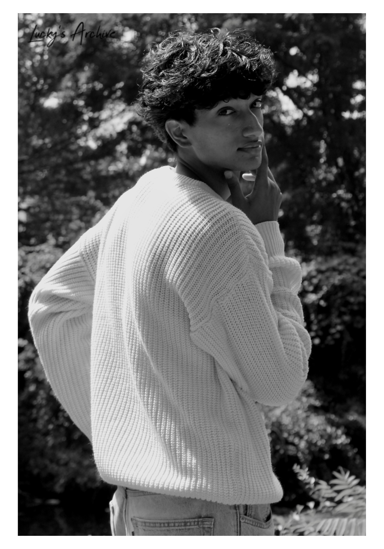 Black and white portrait in a knit sweater